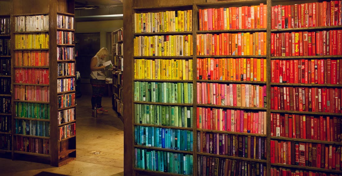 Rows of colored books at The Last Bookstore L.A.