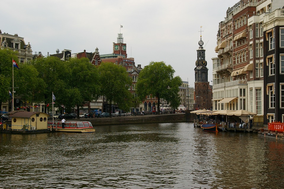 Spotlight on Amsterdam: the city of winding canals, gabled houses and bicycles