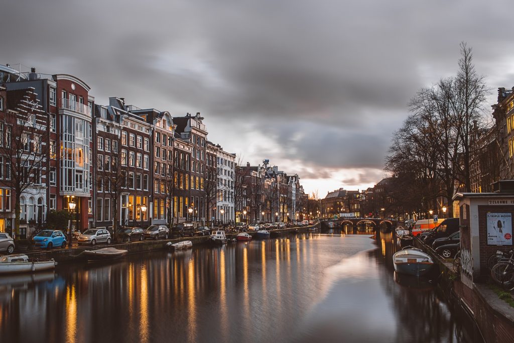 Spotlight on Amsterdam: the city of winding canals, gabled houses and bicycles