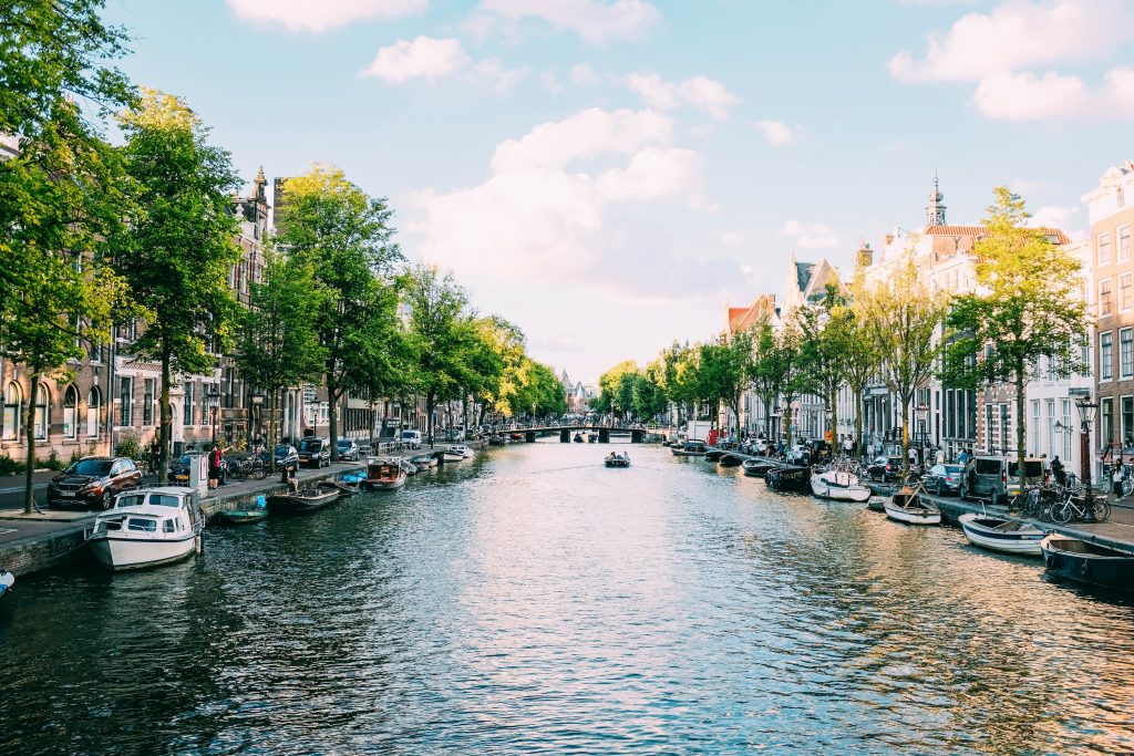 Spotlight on Amsterdam: the city of winding canals, gabled houses and bicycles