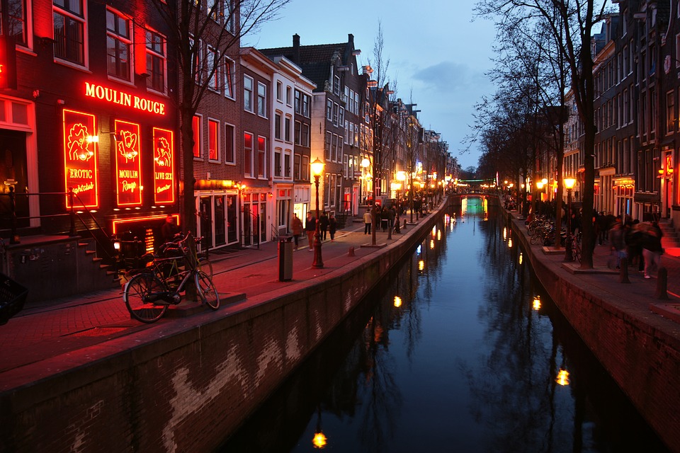 Spotlight on Amsterdam: the city of winding canals, gabled houses and bicycles